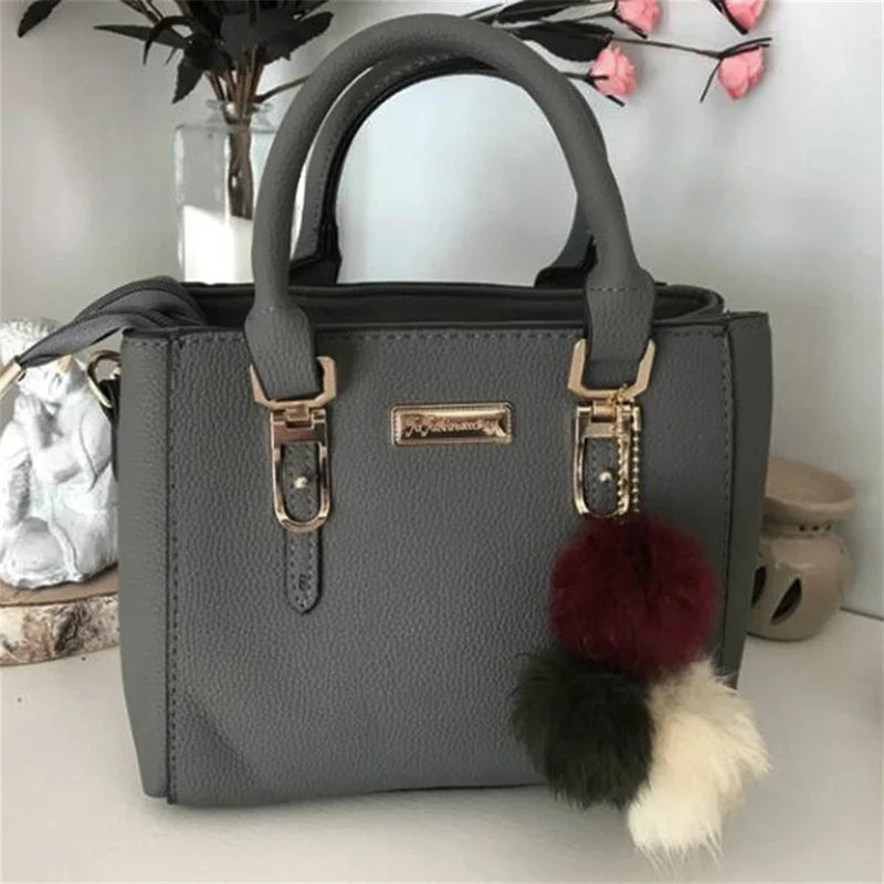 High Capacity PU Handbag: Tassel, Ball, Fashion Statement