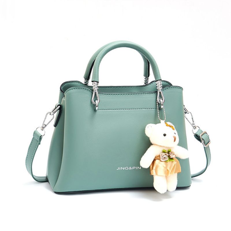 Green Stylish Handbag: Cute Pendant, Double Handles, Fashionable Charm