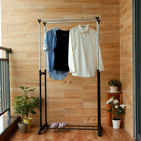 Portable Silver Stainless Steel Clothes Hanger Rack with Wheels Organize and Store Your Clothes Efficiently!