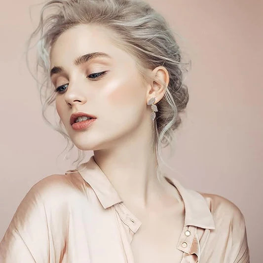 Leaves Carved Crystal Party Wear Ear Tops - Golden