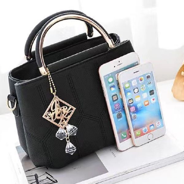 Black Embroidered Handbag: Stylish, Geometric, Tassel Detail, Zip Closure - Shop N Save