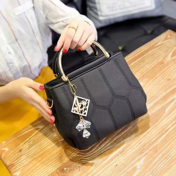 Black Embroidered Handbag: Stylish, Geometric, Tassel Detail, Zip Closure - Shop N Save