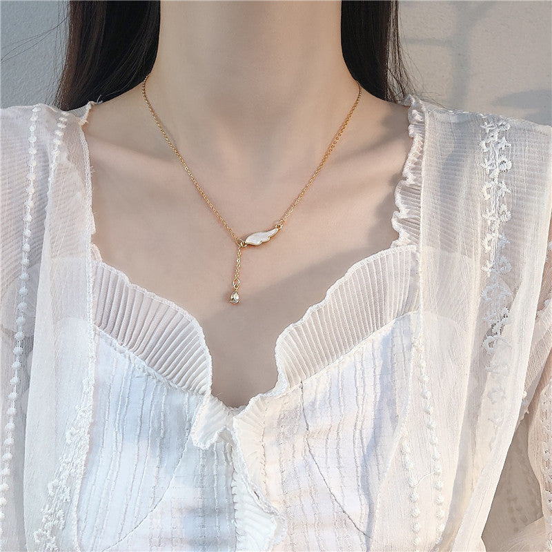 Japanese and Korean Silver Wings Necklace - Retro Tassel Style - Shop N Save