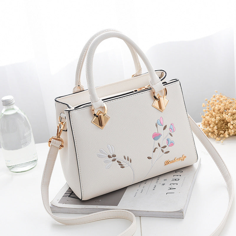 High-Quality Cream White Floral Handbag With Zip Closure And Double Handle .