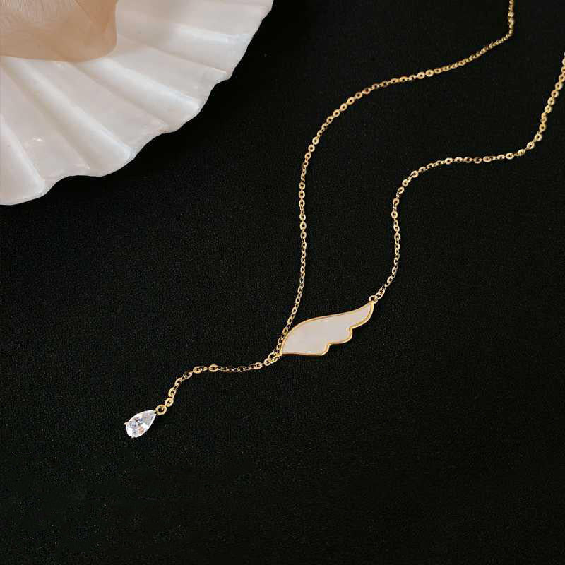 Japanese and Korean Silver Wings Necklace - Retro Tassel Style - Shop N Save