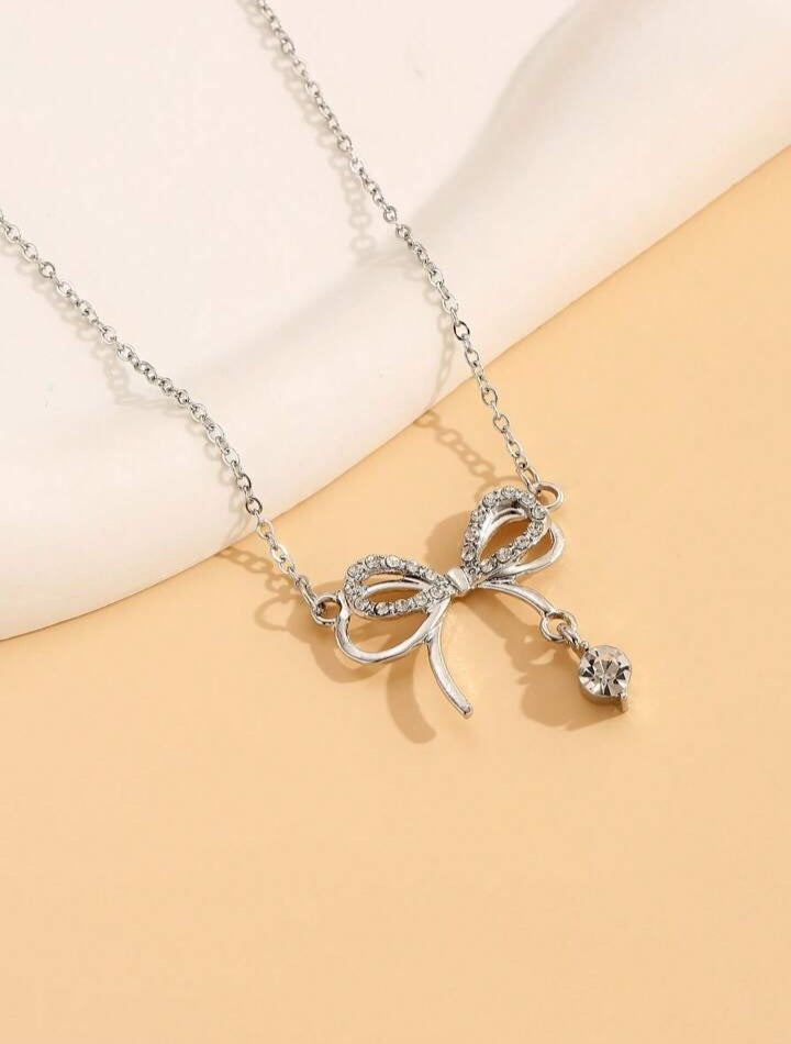 Rhinestone Bow Charm Necklace: Elegant Sparkle Jewelry - Shop N Save