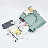 Women's Black Casual Large Capacity Handbag with Bear Pendant Double Handle Zipper Closure Synthetic Leather Exterior and Polyester Interior. - Shop N Save