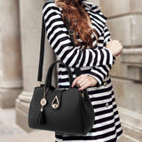 Classy Black Handbag Perfect for Women with a Twist Lock Closure Lichee Pattern Leather Strap Synthetic Leather Exterior Strap