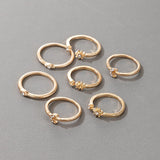 Vipomkowa 7-Piece Blue &amp; Gold Zircon Ring Set: Retro Metal Fashion for Women - Shop N Save
