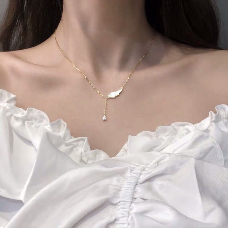 Japanese and Korean Silver Wings Necklace - Retro Tassel Style - Shop N Save