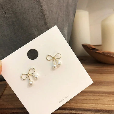 Metal Bow Pearl Earrings - Southeast Korean Fashion 2023 - Shop N Save